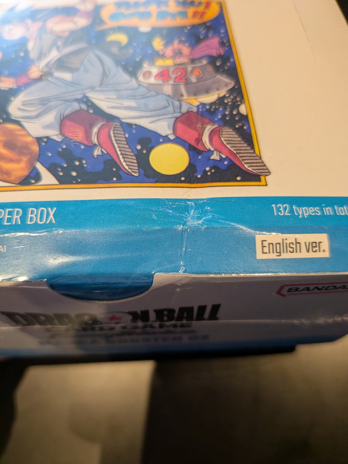 SB02 Manga Booster box close-up showing a crease in the bottom front edge